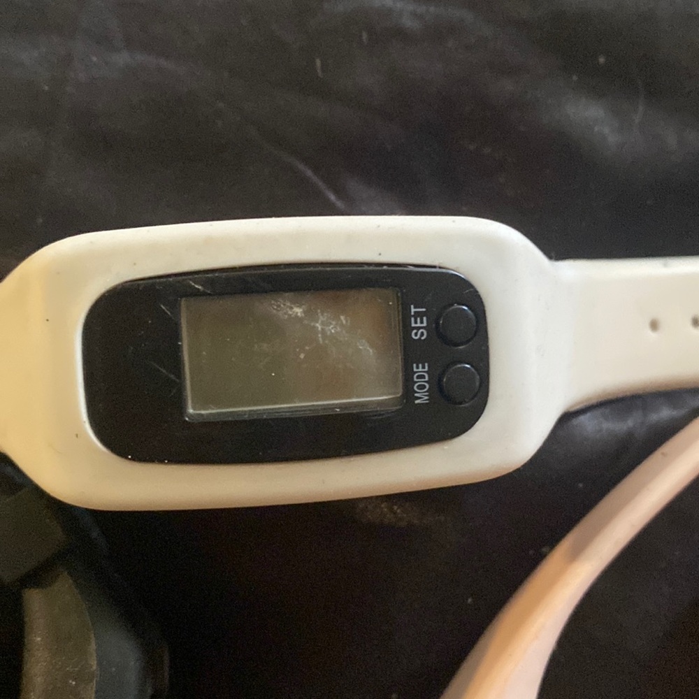 The white Fitbit is 15